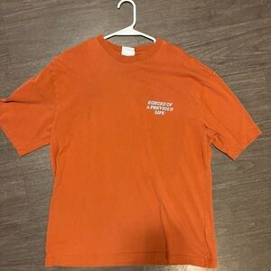 PacSun Burnt Orange Tee with Text Design